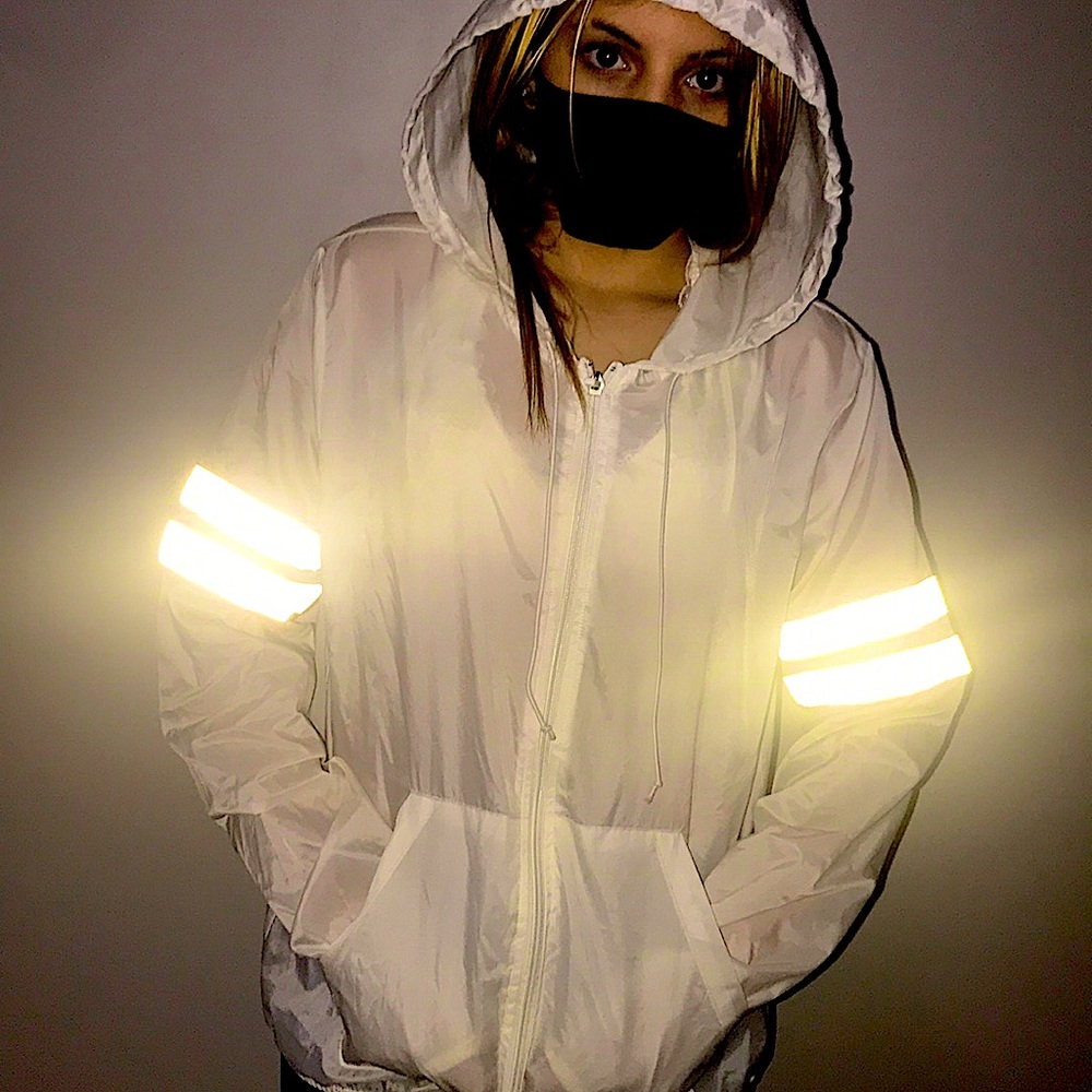 White raincoat with reflective stripes for night
